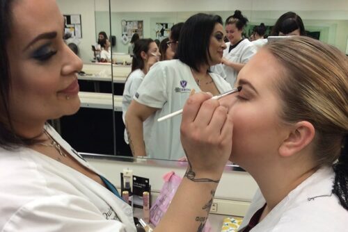 Shore skin care specialty student working on client